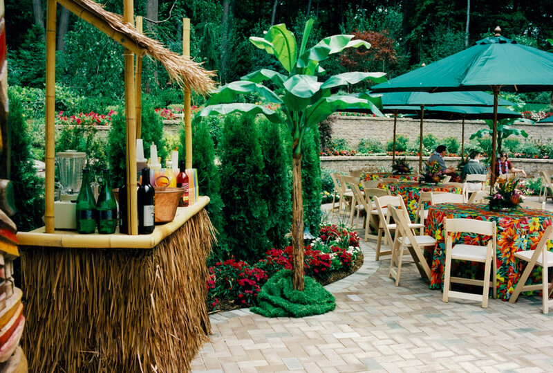 Cabana themed bar with palm decorations