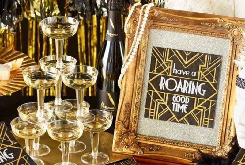 Table with champagne glasses and placard that says