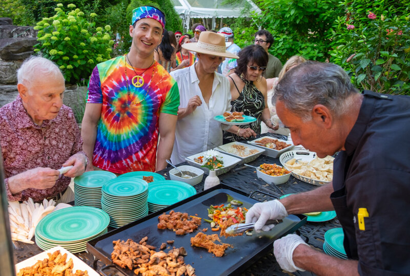 Chef preparing food at buffet line